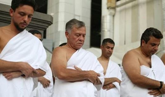 King Abdullah II of Jordan and his son Crown Prince Hussein on Umra in Mecca in 2018